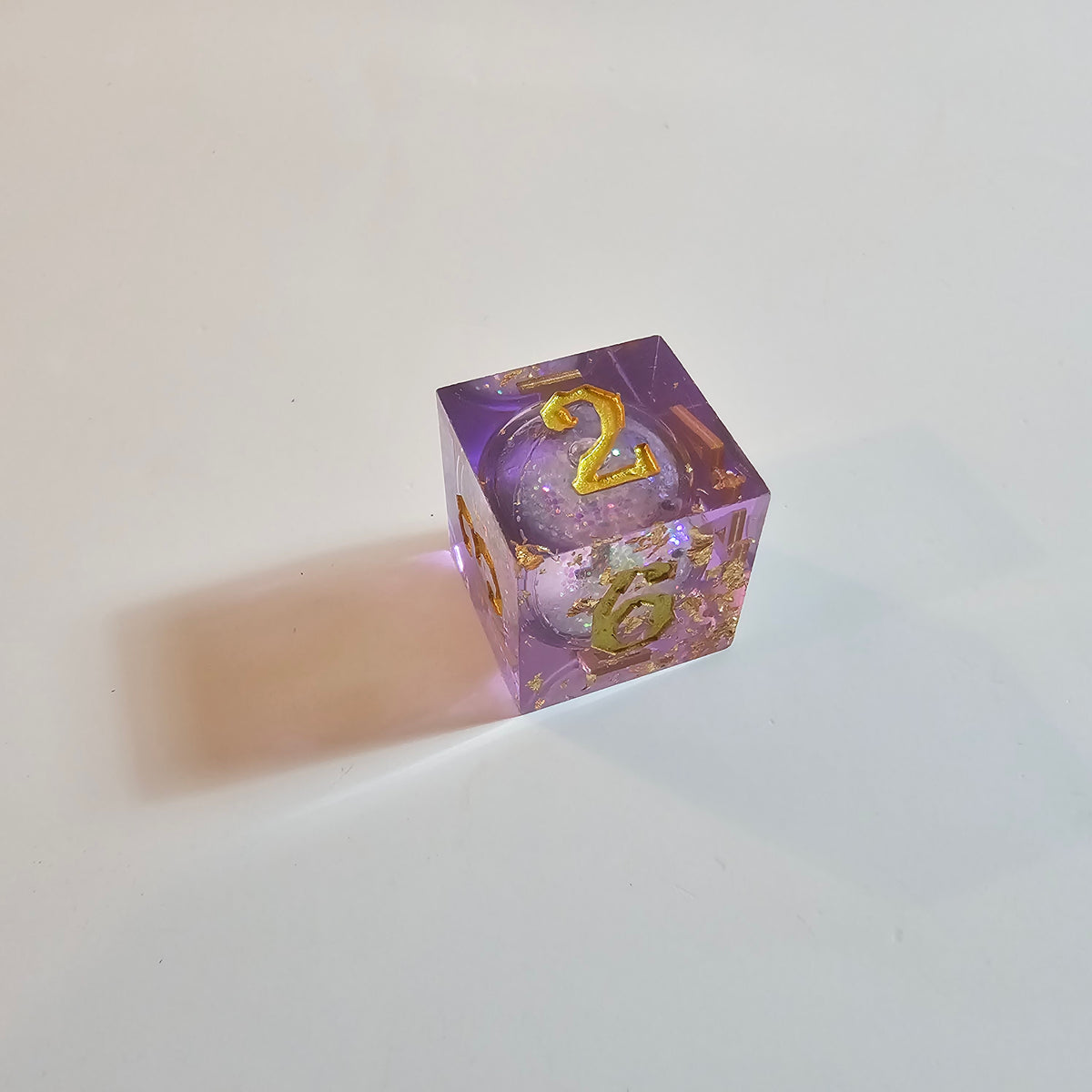 Set di dadi in resina Astral Drift a nucleo liquido