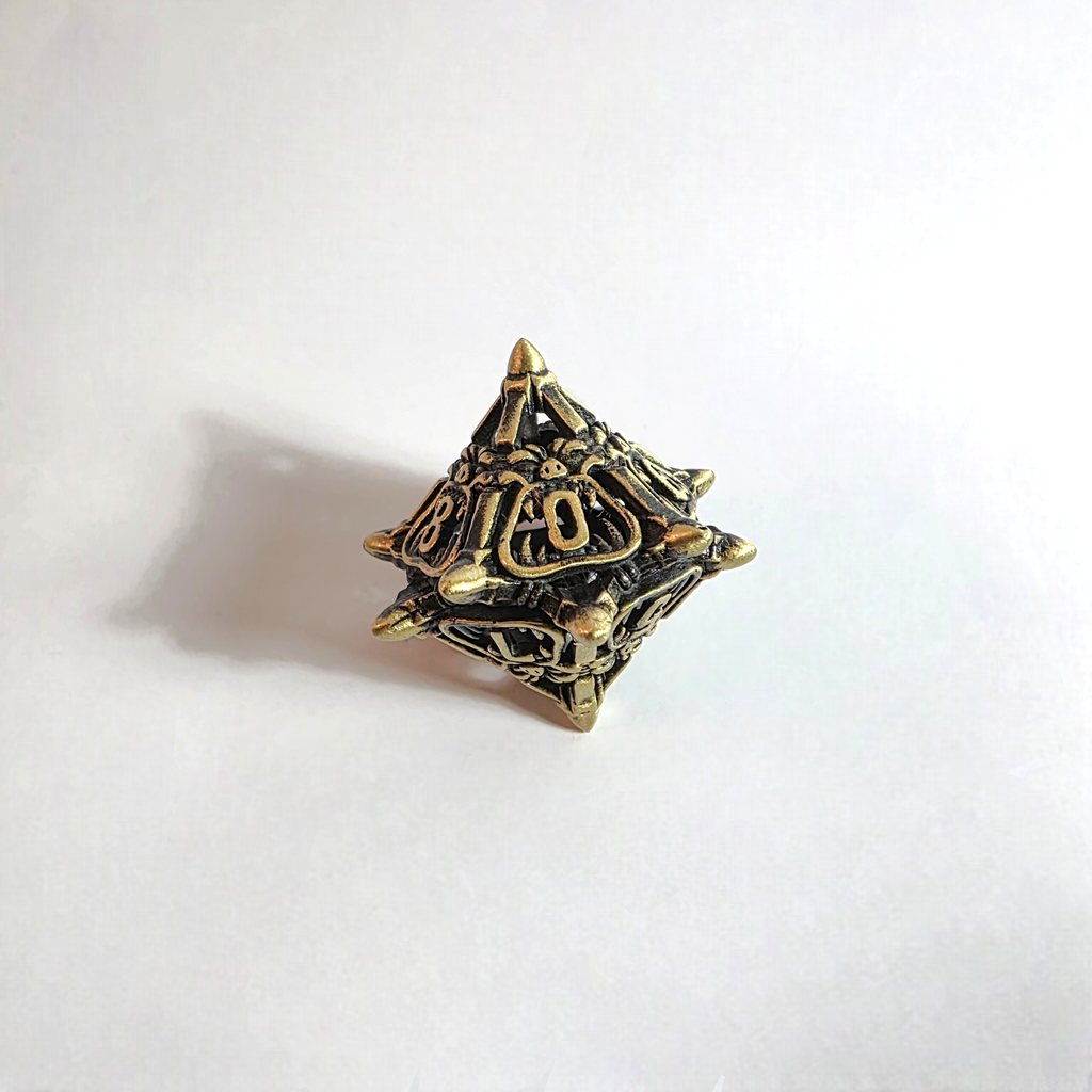 Snarling Mimic Hohlmetall-Würfelset in Antikgold