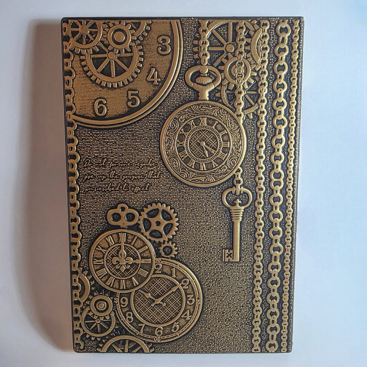 Notizbuch aus Messing mit Dampfzug-Motiv