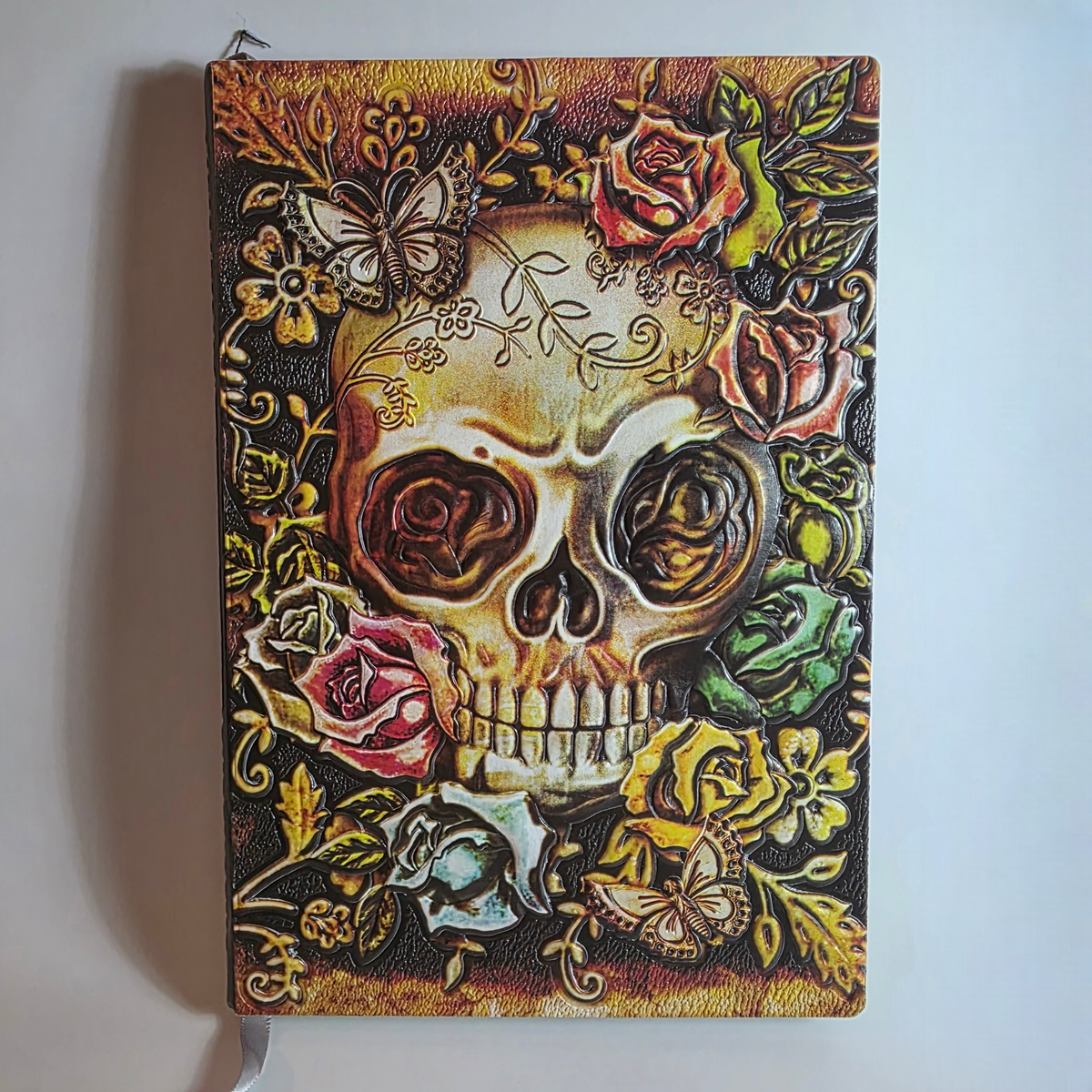 Notizbuch mit buntem Totenkopf