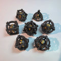 Set de dados de metal hueco oro negro con diseño de huevo de dragón