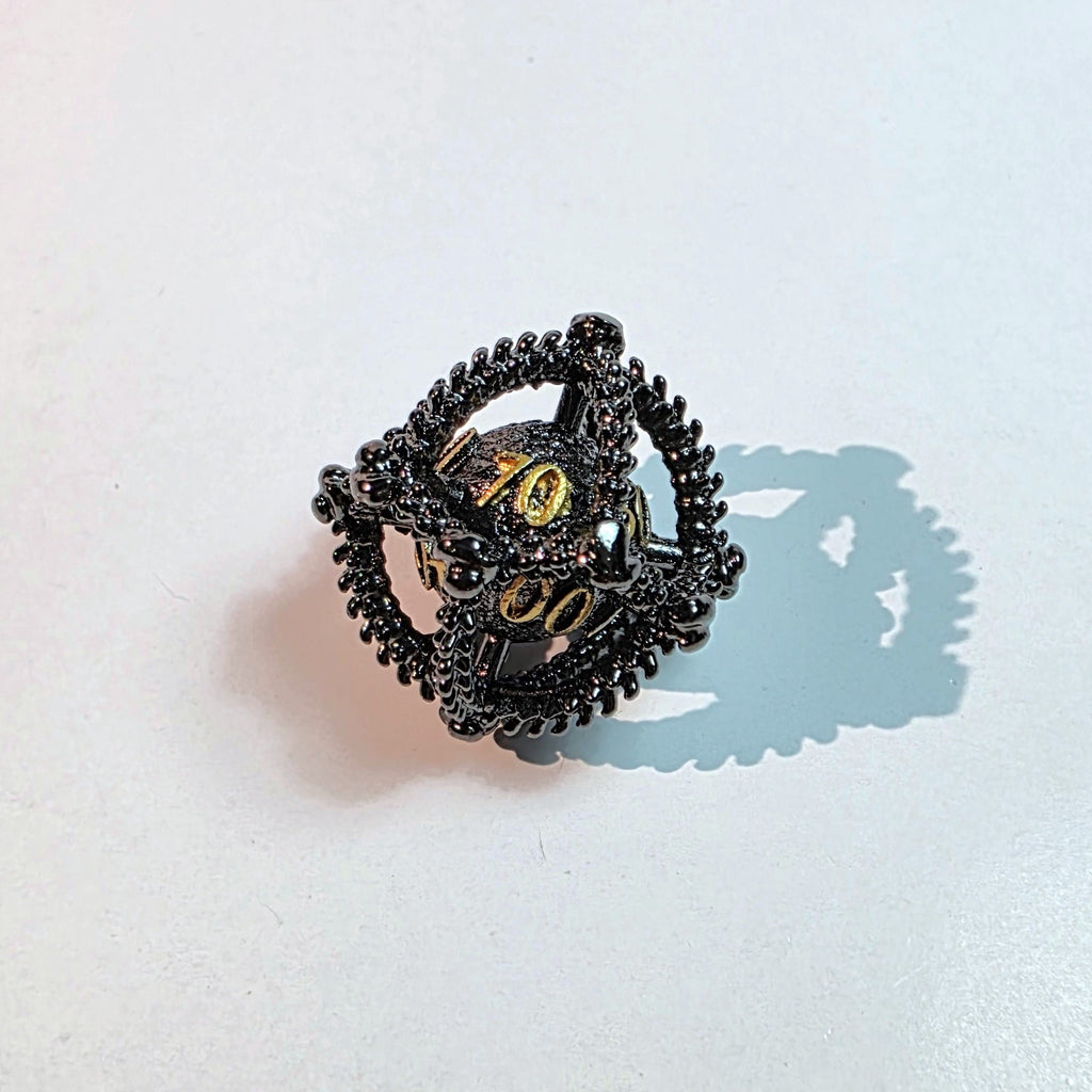 Set de dados de metal hueco oro negro con diseño de huevo de dragón