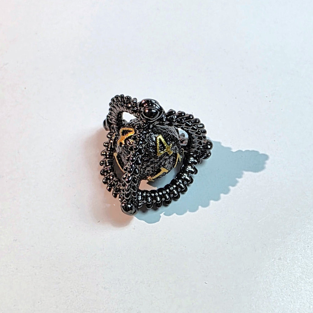 Set de dados de metal hueco oro negro con diseño de huevo de dragón