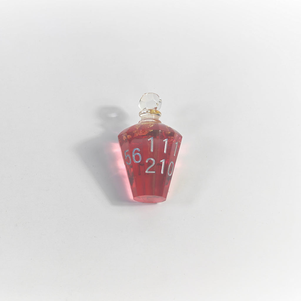 Boccetta di pozione con lamina rossa