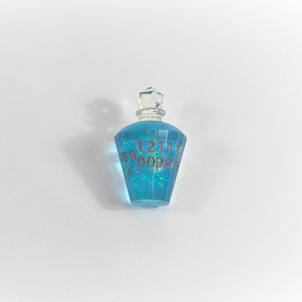 Boccetta di pozione glitter blu